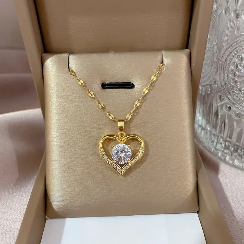 Gold heart pendant necklace with zircon stones